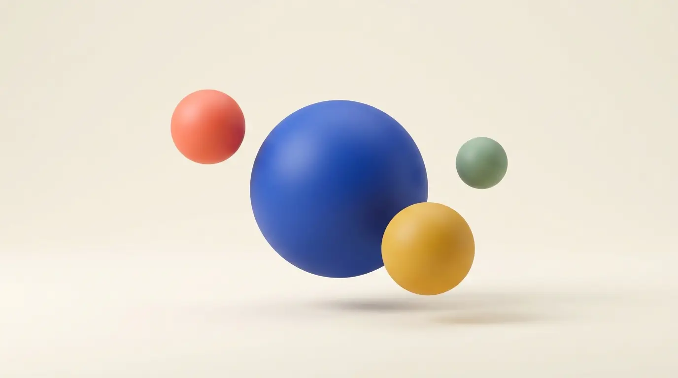 One large central sphere with three smaller satellite spheres in modern colours - a contemporary visual of the portfolio career anchor-and-satellites structure.