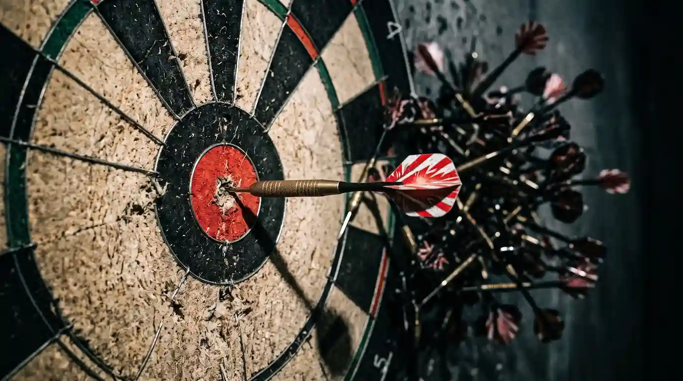 Most accurate career test concept - one dart in the bullseye among many that missed.